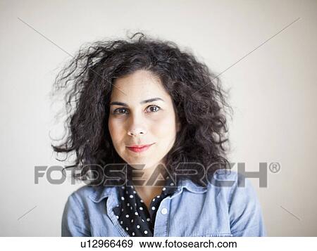 Stock Photo - Portrait of beautiful young woman. Fotosearch