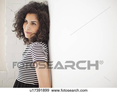 Portrait of beautiful young woman View Large Photo Image Stock Photo - Portrait of beautiful young woman. Fotosearch