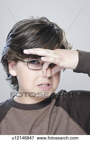 Portrait of boy (10-11), studio shot View Large Photo Image Stock Photo - Portrait of boy (10-11), studio shot. Fotosearch