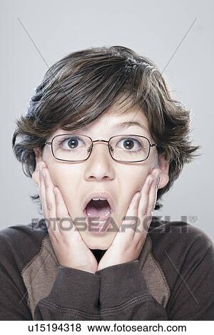 Portrait of boy (10-11), studio shot View Large Photo Image Stock Photo - Portrait of boy (10-11), studio shot. Fotosearch