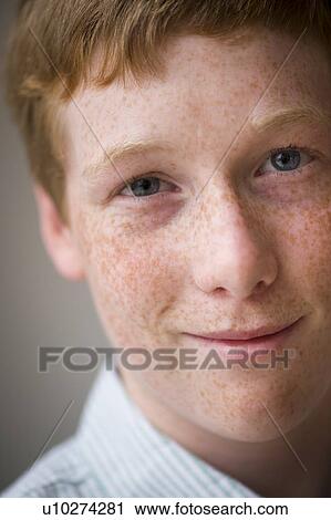 Stock Image - Portrait of boy (16-17). Fotosearch