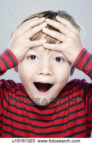 Portrait of boy (6-7), studio shot View Large Photo Image Stock Image - Portrait of boy (6-7), studio shot. Fotosearch