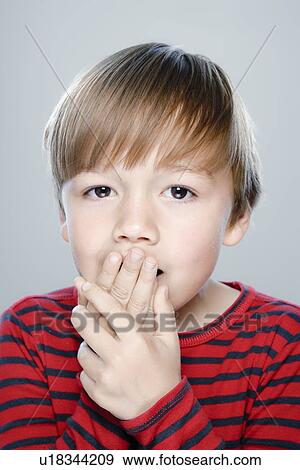 Portrait of boy (6-7), studio shot View Large Photo Image Stock Photo - Portrait of boy (6-7), studio shot. Fotosearch