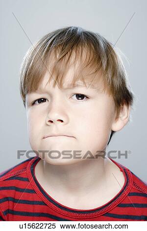 Portrait of boy (6-7), studio shot View Large Photo Image Stock Photography - Portrait of boy (6-7), studio shot. Fotosearch
