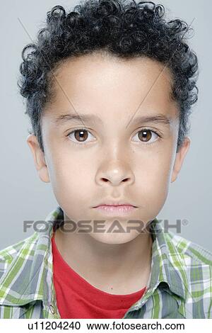 Portrait of boy (8-9), studio shot View Large Photo Image Stock Image - Portrait of boy (8-9), studio shot. Fotosearch