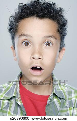 Portrait of boy (8-9), studio shot View Large Photo Image Stock Image - Portrait of boy (8-9), studio shot. Fotosearch