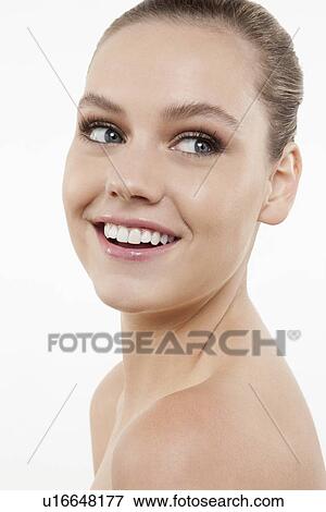 Stock Photo - Portrait of cheerful young woman. Fotosearch