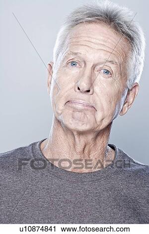 Portrait of confused senior man, studio shot View Large Photo Image Stock Image - Portrait of confused senior man, studio shot. Fotosearch
