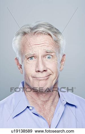 Portrait of confused senior man, studio shot View Large Photo Image Stock Photo - Portrait of confused senior man, studio shot. Fotosearch