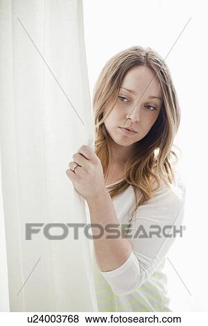 Stock Photo - Portrait of contemplative young woman. Fotosearch