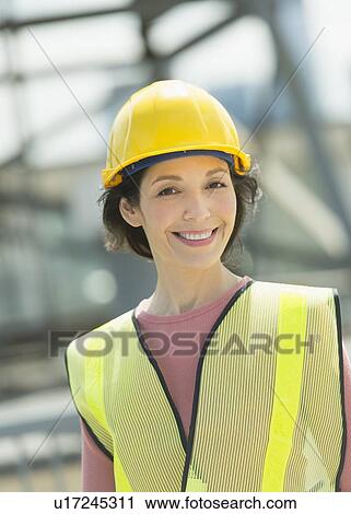 Portrait of female construction worker View Large Photo Image Stock Image - Portrait of female construction worker. Fotosearch