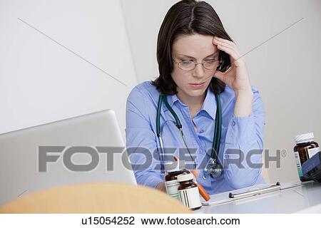 Portrait of female doctor View Large Photo Image Stock Image - Portrait of female doctor. Fotosearch