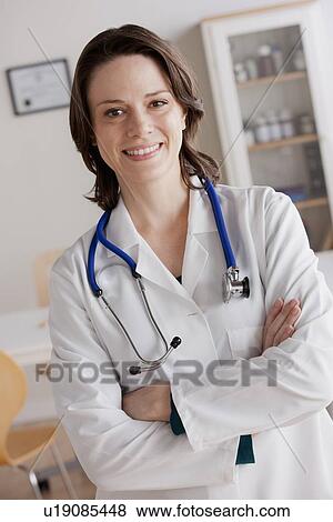 Stock Photo - Portrait of female doctor. Fotosearch