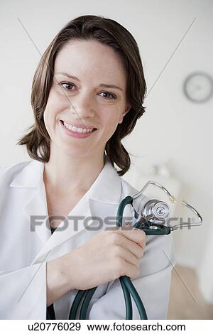 Stock Photo - Portrait of female doctor. Fotosearch