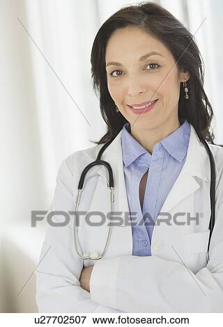 Portrait of female doctor View Large Photo Image Stock Photo - Portrait of female doctor. Fotosearch