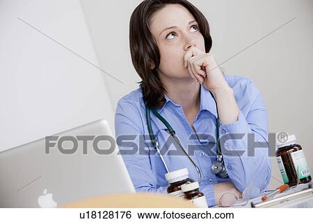 Portrait of female doctor View Large Photo Image Stock Photograph - Portrait of female doctor. Fotosearch