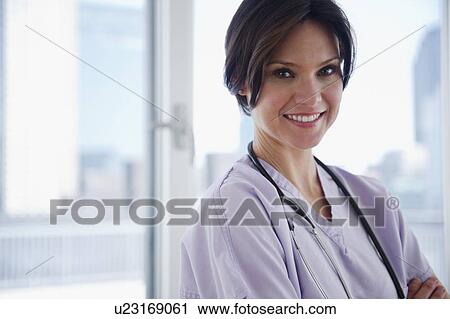 Portrait of female nurse View Large Photo Image Stock Image - Portrait of female nurse. Fotosearch