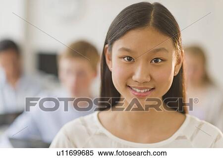 Portrait of female student (14-15) View Large Photo Image Stock Photography - Portrait of female student (14-15). Fotosearch