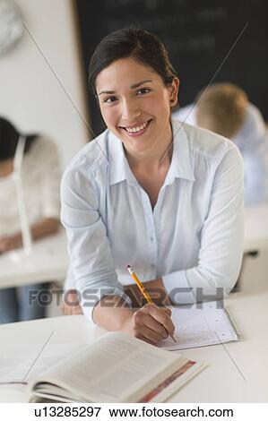 Portrait of female student at school View Large Photo Image Stock Photo - Portrait of female student at school. Fotosearch