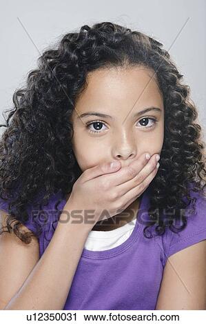 Portrait of girl (10-11), studio shot View Large Photo Image Stock Image - Portrait of girl (10-11), studio shot. Fotosearch