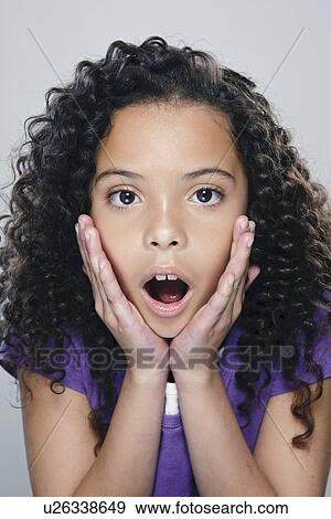 Portrait of girl (10-11), studio shot View Large Photo Image Stock Photo - Portrait of girl (10-11), studio shot. Fotosearch