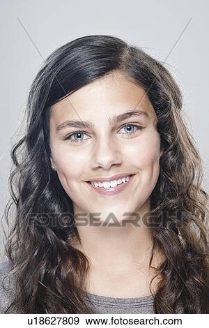 Portrait of girl (12-13), studio shot View Large Photo Image Stock Photo - Portrait of girl (12-13), studio shot. Fotosearch
