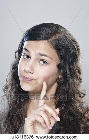 Portrait of girl (12-13), studio shot View Large Photo Image Stock Photograph - Portrait of girl (12-13), studio shot. Fotosearch