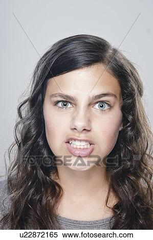 Portrait of girl (12-13), studio shot View Large Photo Image Stock Photography - Portrait of girl (12-13), studio shot. Fotosearch