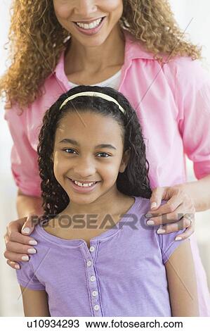 Portrait of girl (12-13) with mother View Large Photo Image Stock Image - Portrait of girl (12-13) with mother. Fotosearch