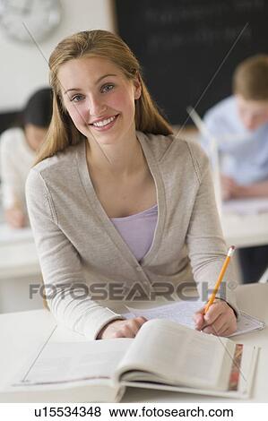 Stock Photo - Portrait of girl (16-17) at school. Fotosearch