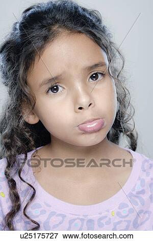 Portrait of girl (6-7), studio shot View Large Photo Image Stock Photo - Portrait of girl (6-7), studio shot. Fotosearch