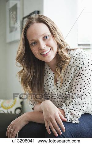 Portrait of happy young woman View Large Photo Image Stock Image - Portrait of happy young woman. Fotosearch