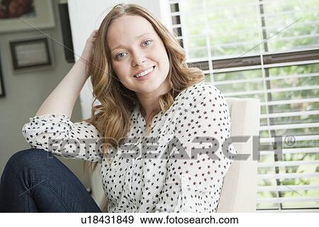 Portrait of happy young woman View Large Photo Image Stock Photo - Portrait of happy young woman. Fotosearch