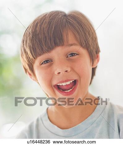 Portrait of laughing boy (10-11 years) View Large Photo Image Stock Photograph - Portrait of laughing boy (10-11 years) . Fotosearch