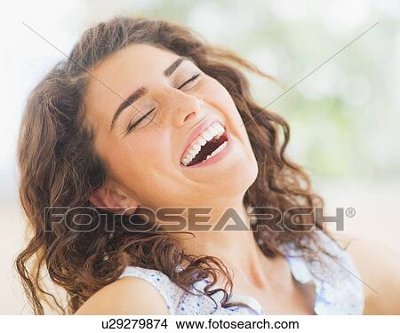 Portrait of laughing woman View Large Photo Image Picture - Portrait of laughing woman. Fotosearch