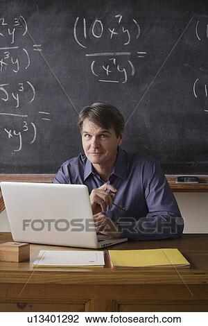 Stock Image - Portrait of maths teacher. Fotosearch