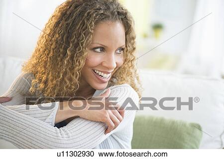 Stock Image - Portrait of mature woman. Fotosearch