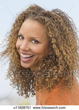 Stock Image - Portrait of mature woman. Fotosearch