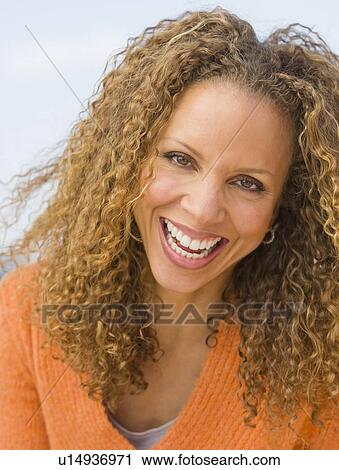 Stock Image - Portrait of mature woman. Fotosearch