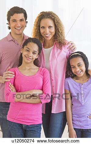 Portrait of parents with daughters (10-13) View Large Photo Image Picture - Portrait of parents with daughters (10-13). Fotosearch