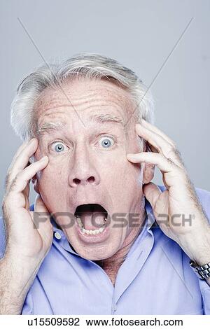 Portrait of scared senior man, studio shot View Large Photo Image Stock Image - Portrait of scared senior man, studio shot. Fotosearch