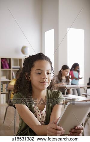 Portrait of schoolgirl (10-11) View Large Photo Image Stock Image - Portrait of schoolgirl (10-11). Fotosearch