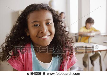 Portrait of schoolgirl (10-11) View Large Photo Image Stock Photograph - Portrait of schoolgirl (10-11). Fotosearch