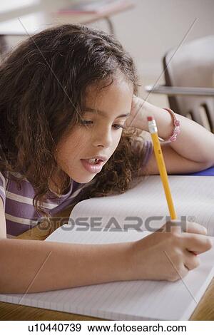 Stock Photo - Portrait of schoolgirl. Fotosearch