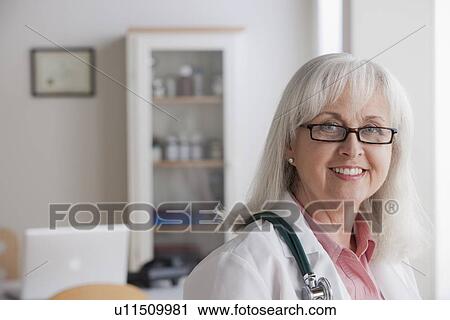 Portrait of senior doctor View Large Photo Image Stock Image - Portrait of senior doctor. Fotosearch