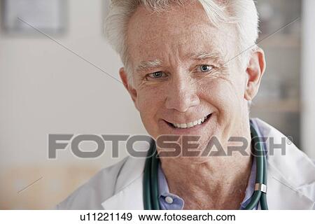 Stock Photo - Portrait of senior doctor. Fotosearch