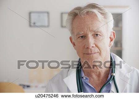 Stock Photograph - Portrait of senior doctor. Fotosearch