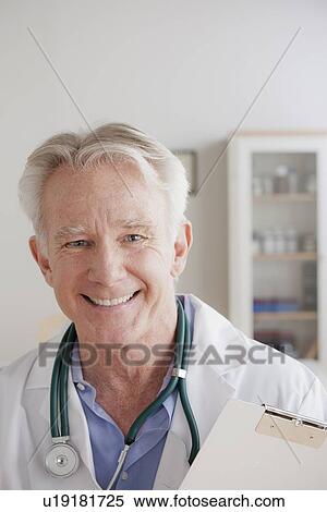 Portrait of senior doctor View Large Photo Image Stock Photography - Portrait of senior doctor. Fotosearch