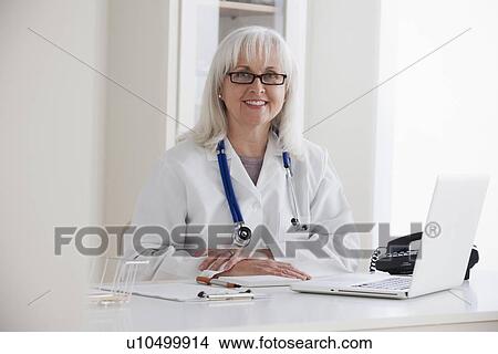 Picture - Portrait of senior female doctor. Fotosearch