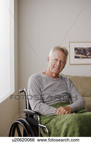 Portrait of senior man on wheelchair View Large Photo Image Stock Photo - Portrait of senior man on wheelchair. Fotosearch